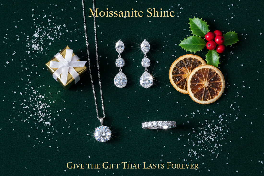 Three moissanite Christmas jewelry gifts including platinum drop earrings solitaire pendant necklace and eternity band on forest green velvet with gold gift box holly berries and dried orange slices festive 2026 holiday fine jewelry gift guide