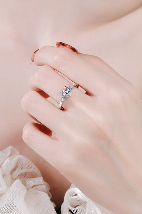 Modern handcrafted Amore Heart 1.2ct moissanite engagement ring with premium rhodium finish
​High quality multi layered rhodium plating on flawless D color heart moissanite band
​Sustainable Moissanite Shine ethical 1.2 carat heart shape gemstone proposal ring USA
​Flawless VVS1 geometric facets on 1.2ct heart moissanite promise ring with upgrade program
​High status conscious luxury custom solid gold heart moissanite anniversary ring option
